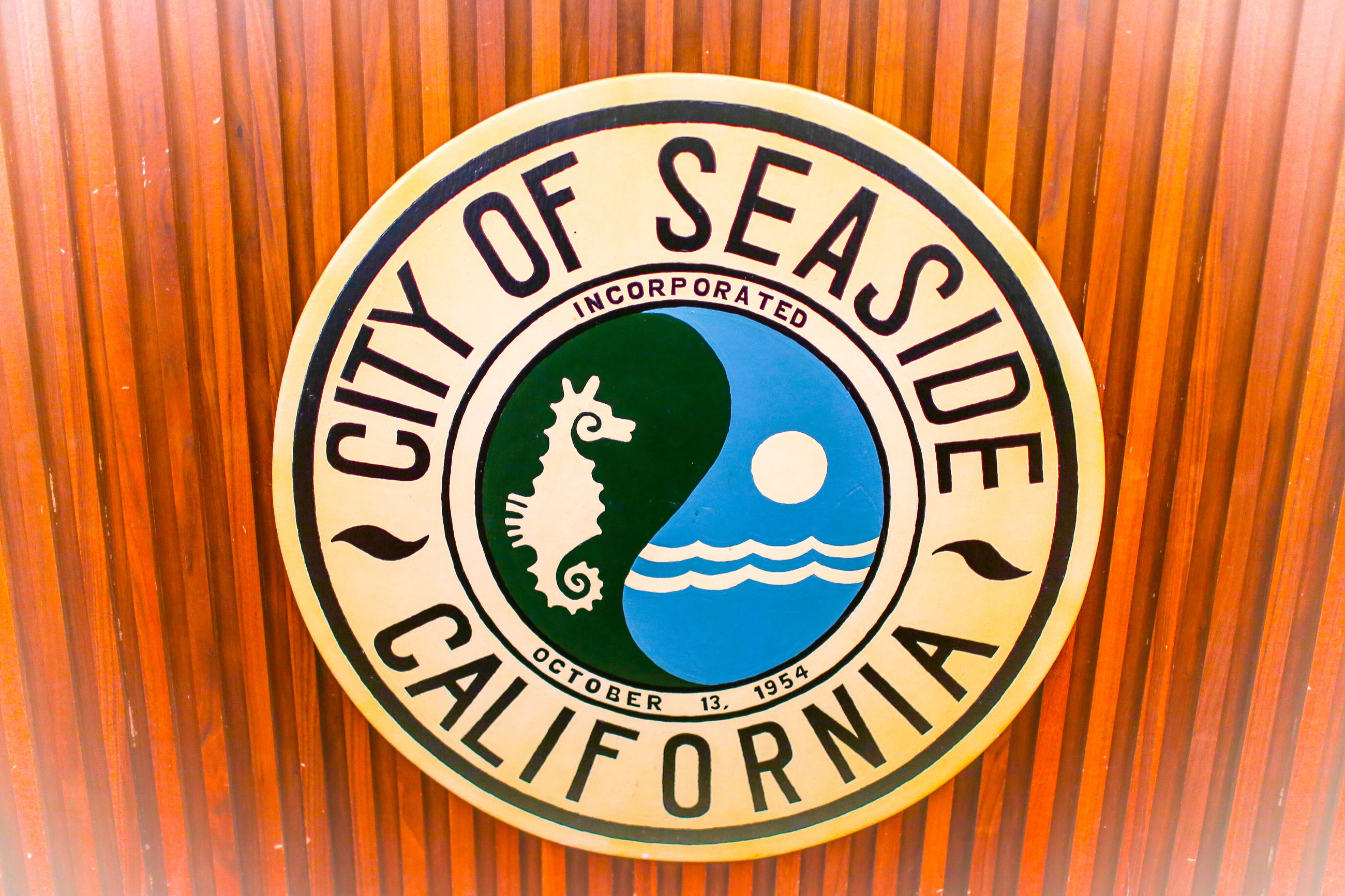 City of Seaside seal on dias